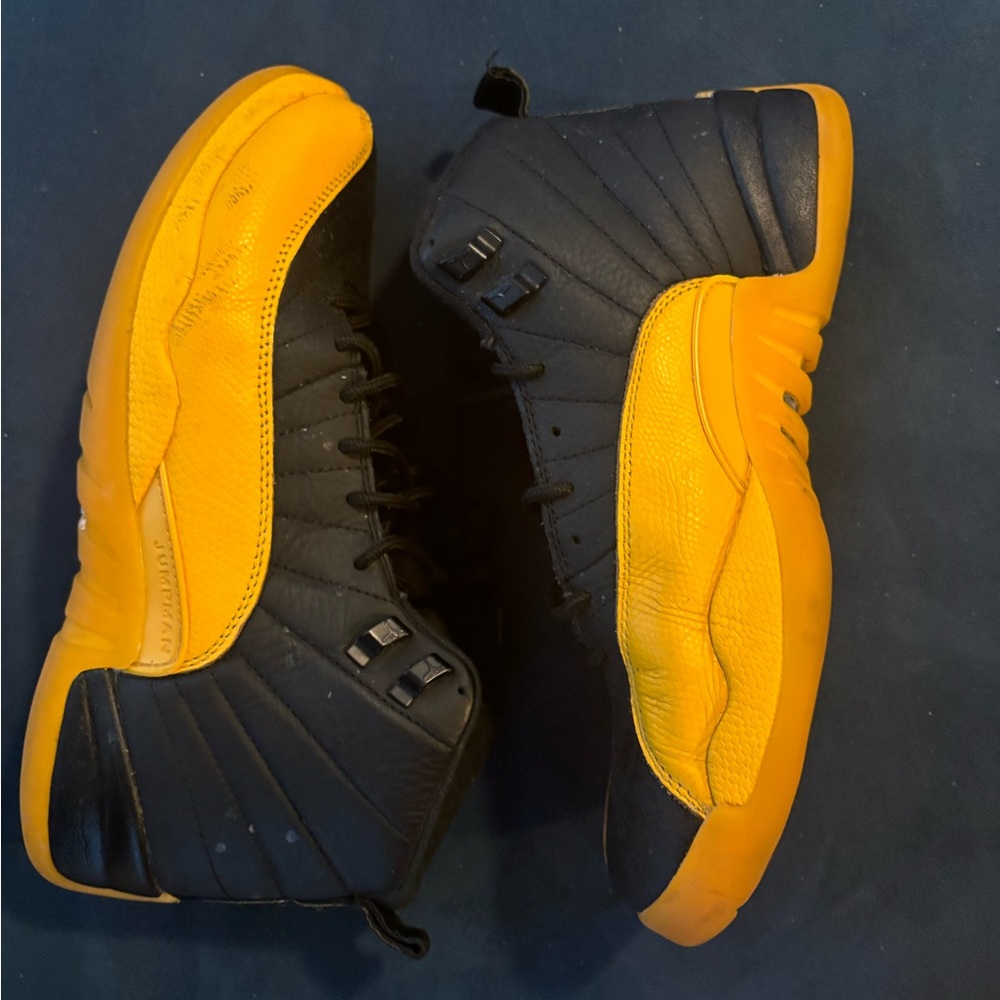 Jordan size 11 Black and Yellow 12s-worn
